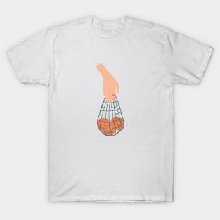 Hand holding a string bag full of fruits T-Shirt